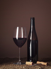 Bottle and glass of red wine