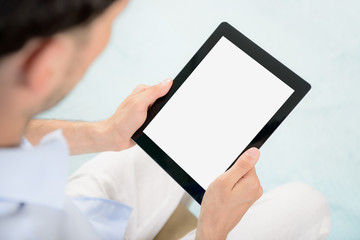 Blank tablet computer in hands