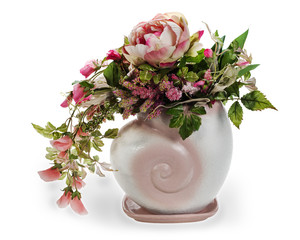 colorful floral arrangement in a pink ceramic vase, isolated on