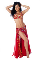Belly dancer wearing a red bellydance costume