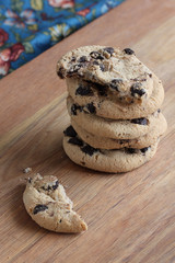 Stack of homemade cookies on wooden background