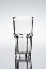 Tumbler, cocktail glass on gradient background