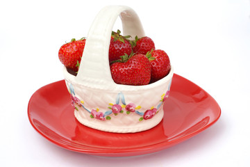 Strawberries  in vase isolated on white