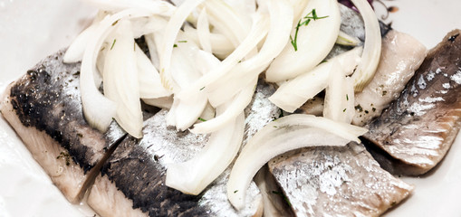 Herring cut with onions