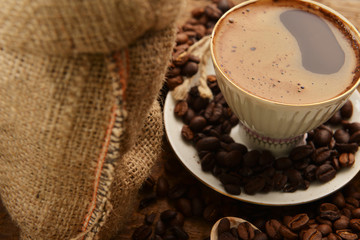 Coffee beans and cup