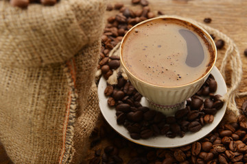Coffee beans and cup