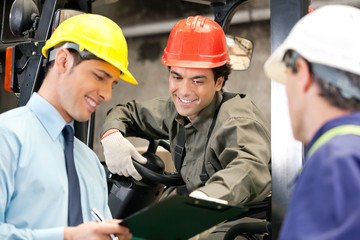 Workers And Supervisors At Warehouse