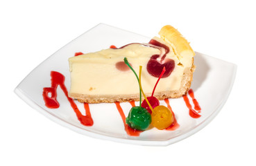 Closeup of a slice of cherry cheesecake on a white background