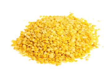 Yellow lentils isolated on white background. Macro shot