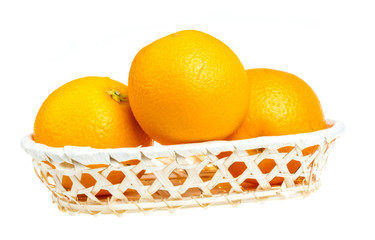 heap of oranges in the dish on white background