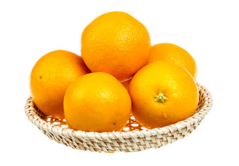 heap of oranges in the dish on white background