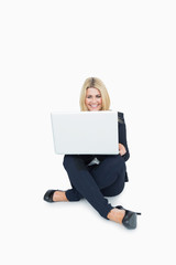 Business woman using her laptop