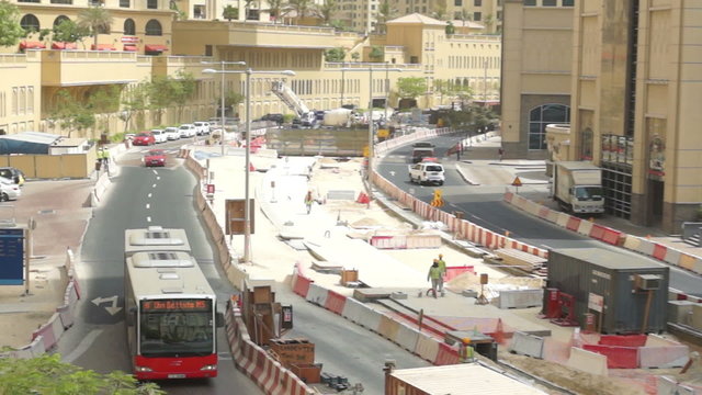 Dubai Marina Skyscraper tilt and pan with Bus