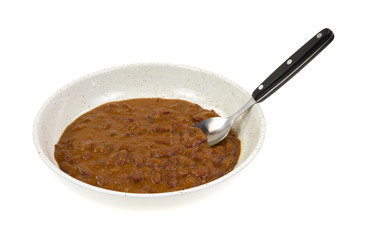 Red kidney bean curry in dish with spoon