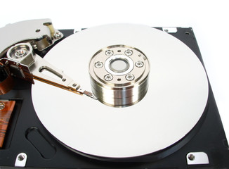 Opened computer hard disk drive isolated on white closeup