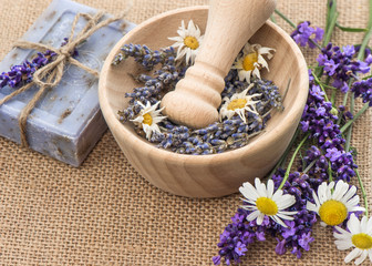 mortar with fresh lavender and chamomile