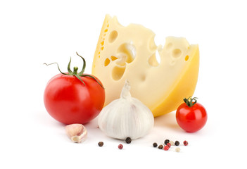 Cheese, tomatoes and garlic isolated on white background