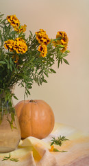 marigold bouquet and pumpkin