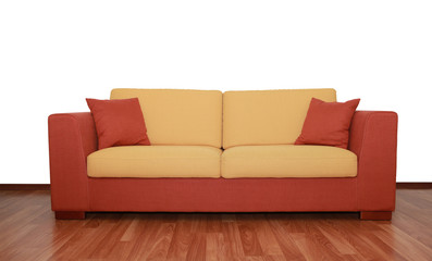 nice yellow-orange textile sofa with pillows