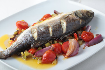 Baked sea bass with vegetables