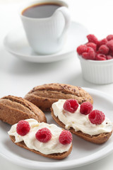 Sandwiches with soft cheese and raspberry