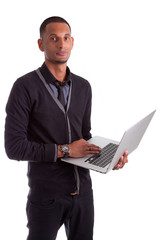 Young african american man using a laptop