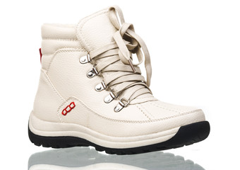 White ankle high women boot over white