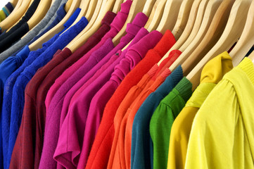 colorful clothing on hanger in a row