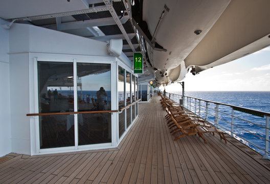 Landscape image of promenade deck on cruise ship.