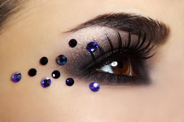 Naklejka premium Eye with black fashion make-up