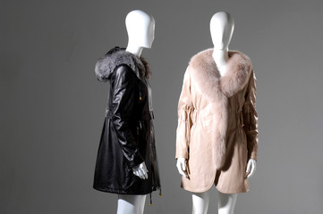 Two Winter coat dress on mannequin