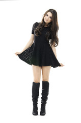 Full length portrait of a casual young fashion model posing