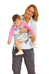 Happy mother playing with her girl