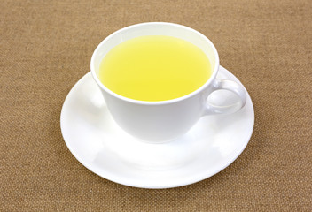 Lemon juice in cup and saucer