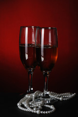 White Wine Glasses and pearl necklace