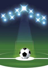 Soccer ball on grass background