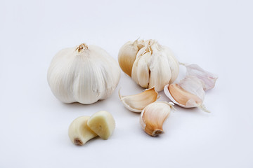 Garlic bulb and cloves isolated on white with clipping path