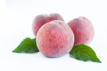 Three large fragrant peaches