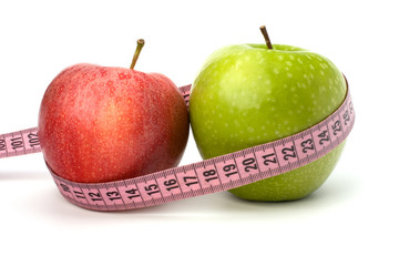 Apple with tape measure. Healthy lifestyle concept.