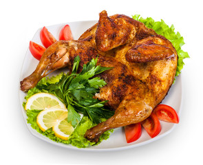 roast chicken with vegetables and lemon