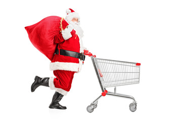 Santa Claus with a bag on his shoulder pushing a shopping cart