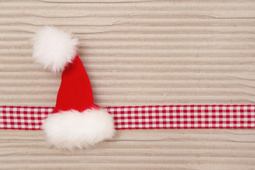 Obraz na płótnie Canvas Christmas tła z Santa Claus kapelusz