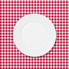 White plate on tablecloth