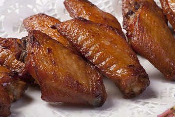 Chicken wings barbequed.