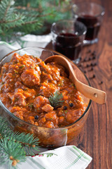 Braised oxtails with carrots celery and tomato. Selective focus