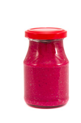 preserved horseradish in glass jar on white