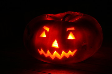 Scary pumpkin with candle ligth
