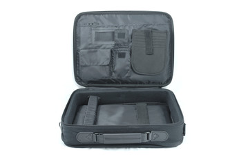 Opened black business suitcase - isolated