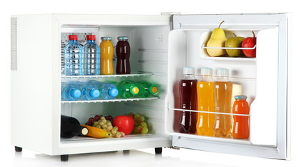 mini fridge full of bottles of juice, soda and fruit isolated - obrazy, fototapety, plakaty