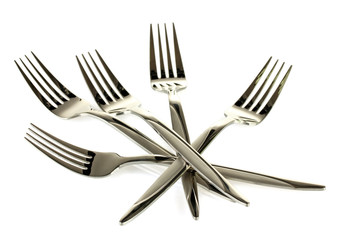 a set of forks isolated on white